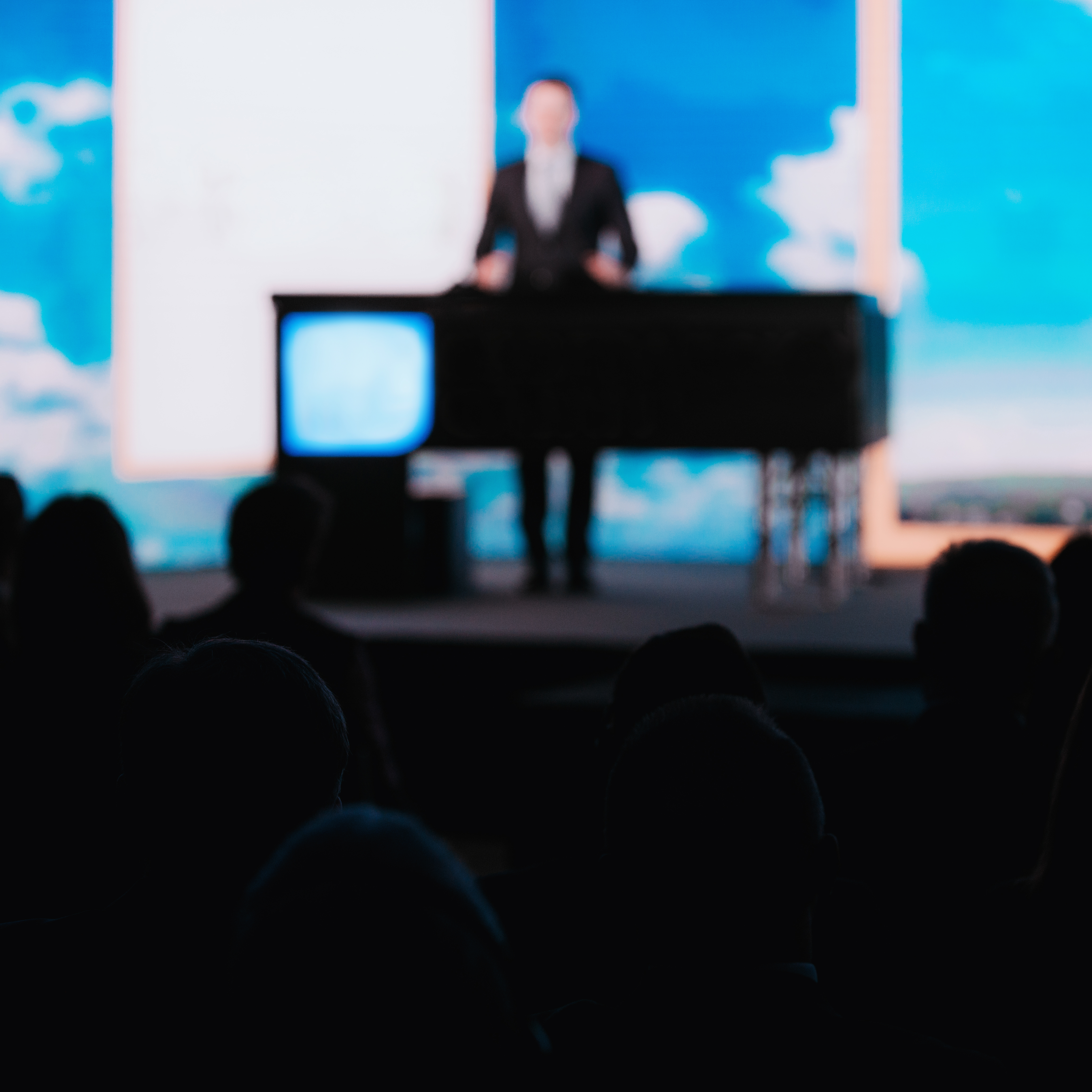 Conference speaker on stage