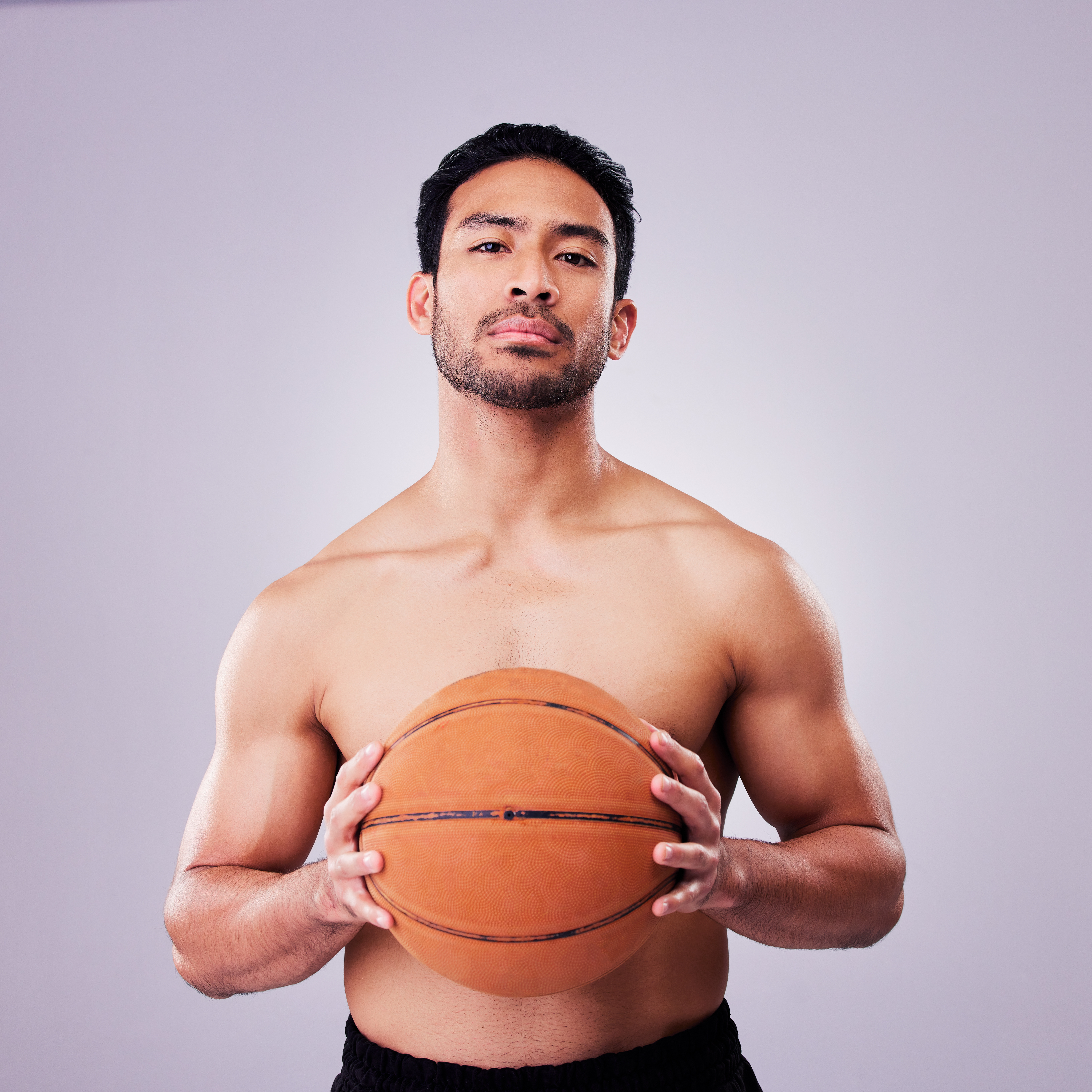 Sports coach with basketball
